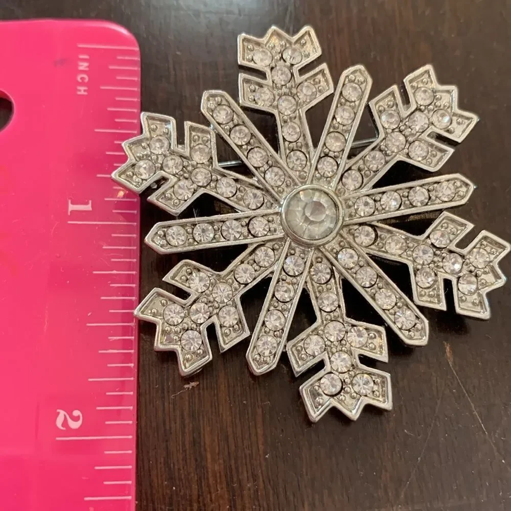 Monet snowflake rhinestone brooch